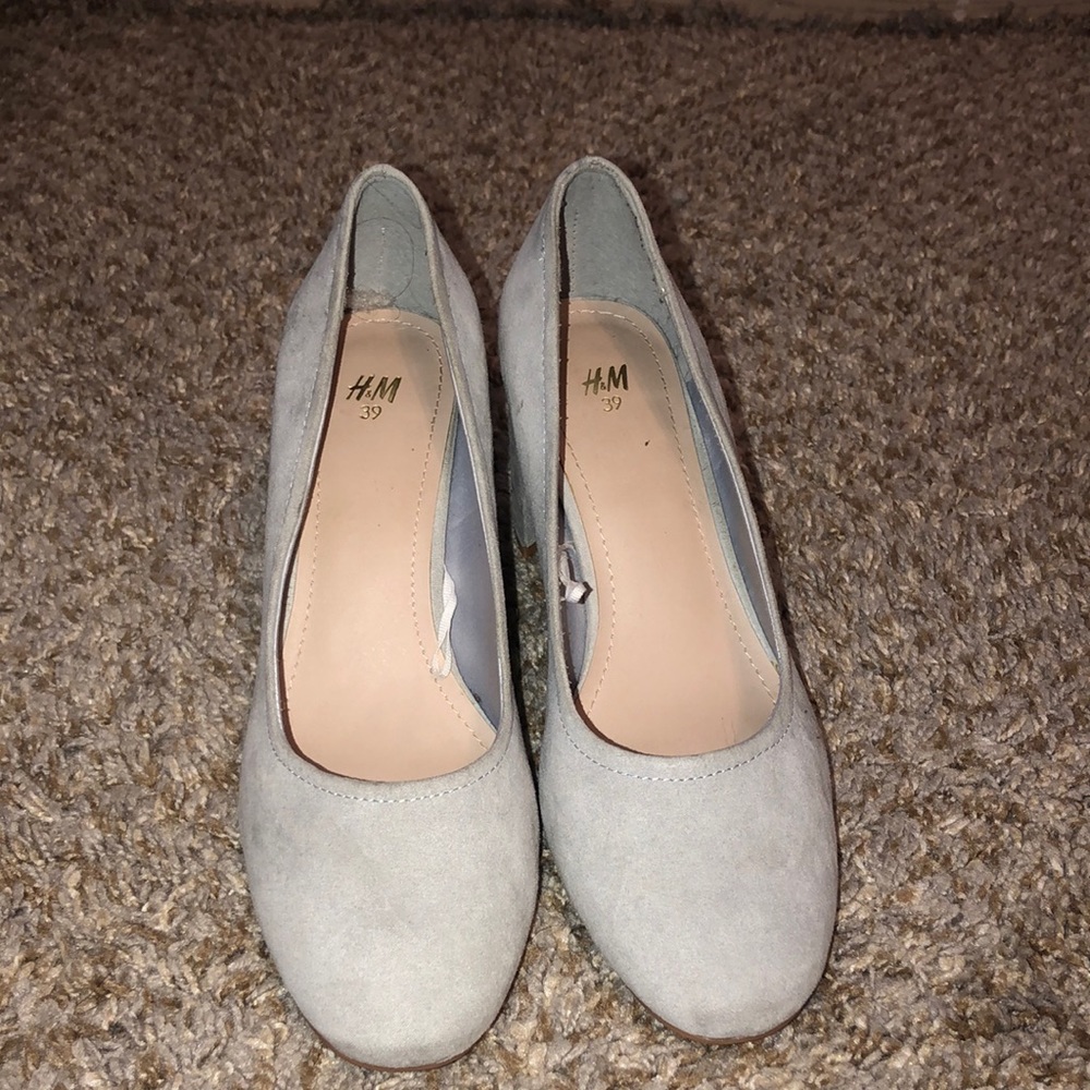 Round toed lower heels. Light blue and very comfy. Worn about once.